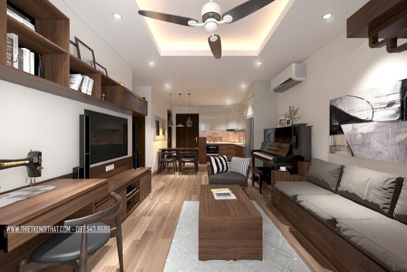Phòng khách chung cư được trang trí với màu trầm từ nội thất gỗ, tạo nên một cảnh quan đẹp và ấn tượng.